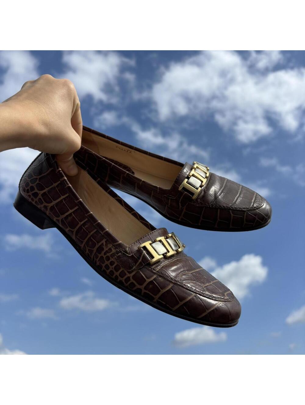 Italian crocodile pattern leather loafers with mixed metal, low heel.